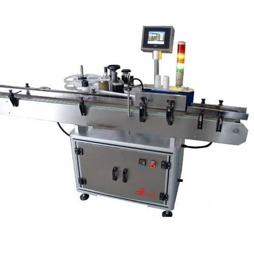 Automatic conveyor belt labeling machine with stainless steel frame, rollers, and a control panel with a touchscreen display and signal lights on top.